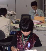 Niigata Pref. employees wear ribbons to support abductees